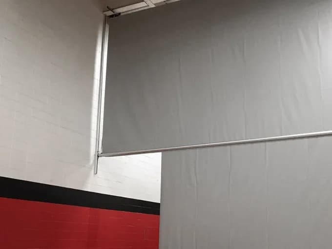 Center-Roll Divider Curtain; Wall Guided-Dual Motor